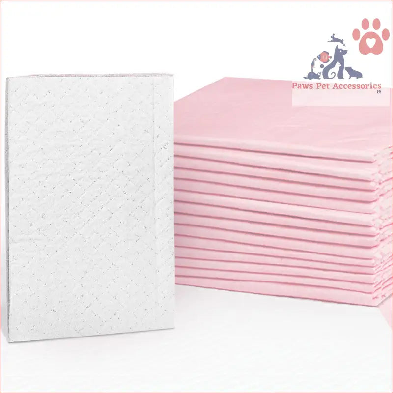 Stack of pink and white i.Pet Pet Training Pads 200pcs 60x60cm for puppy potty training